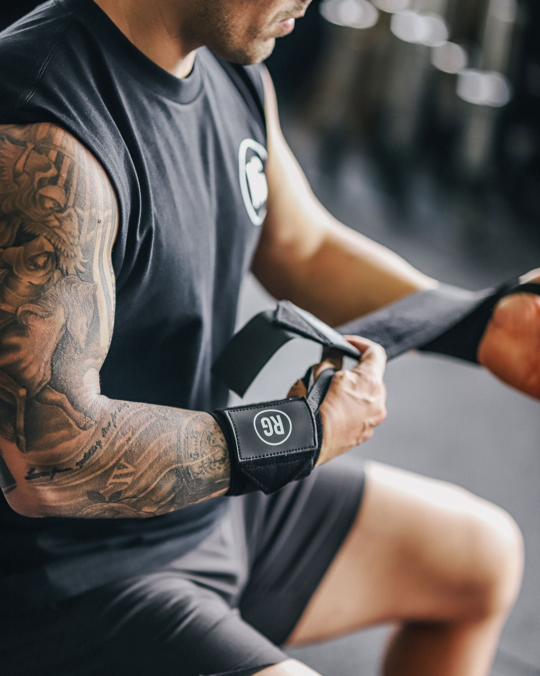 RooGrips Black Crossfit Wrist Wraps  On Mans Wrist